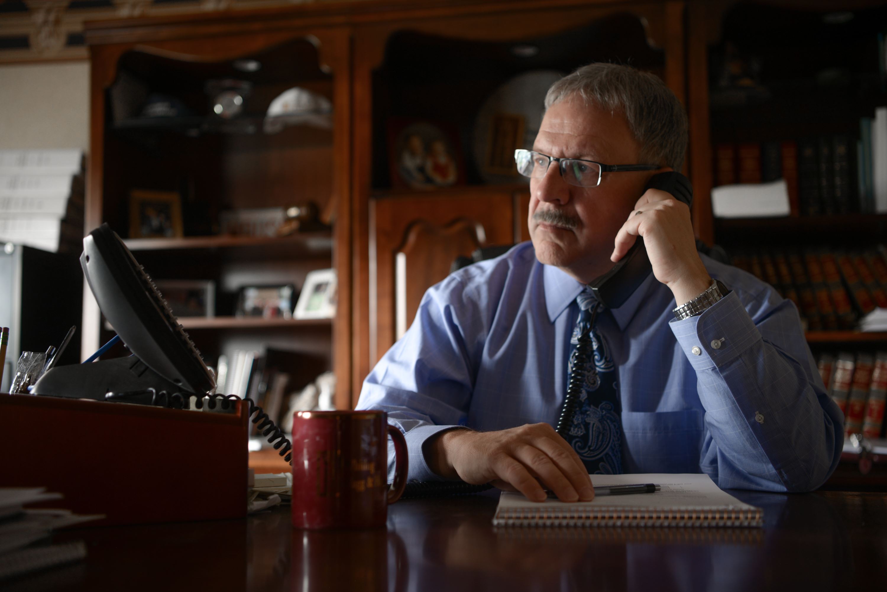 Attorney Rexford Hagg on the phone with a client